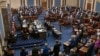 In this image from video, Sen. Patrick Leahy, D-Vt., the president pro tempore of the Senate, who is presiding over the impeachment trial of former President Donald Trump, swears in members of the Senate for the impeachment trial at the U.S. Capitol…