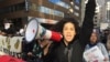 Hundreds of protesters marched in the hand-clenching cold Thursday in Washington to mark the Day Without Immigrants. (V. Macchi/VOA)