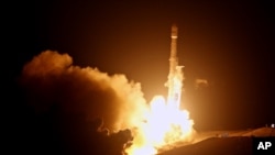 A SpaceX Falcon 9 rocket is launched from the Space Launch Complex-4 at Vandenberg Air Force Base, Calif., Oct. 9, 2017. On Oct. 11, SpaceX launched a rocked from Florida's Kennedy Space Center.