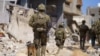 Esta fotografía publicada por el ejército israelí el 18 de mayo de 2024 muestra a soldados israelíes durante operaciones militares en la Franja de Gaza, en medio del conflicto en curso entre Israel y el grupo militante palestino Hamás.