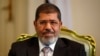 Egypt's President Mohamed Mursi at the presidential palace in Cairo, October 8, 2012 file photo. 