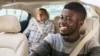 FILE - A passenger gets a ride from an Uber driver in South Africa.