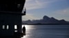 FILE - Personnel stand aboard the Finnish icebreaker MSV Nordica as it arrives into Nuuk, Greenland, after traversing the Northwest Passage through the Canadian Arctic Archipelago, July 29, 2017.