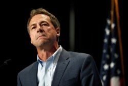 FILE - Democratic presidential candidate Steve Bullock speaks during the Iowa Democratic Party's Hall of Fame Celebration in Cedar Rapids, Iowa, June 9, 2019.