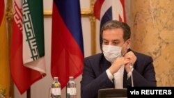 FILE - Iran's top nuclear negotiator, Abbas Araqchi, attends a meeting of the JCPOA Joint Commission in Vienna, Austria, Sept. 1, 2020. 