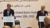 U.S. Secretary of State John Kerry, left, and Tunisian Foreign Minister Taieb Baccouche speak to reporters in Tunis, Tunisia, Nov. 13, 2015. 
