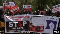 FILE - Protesters march in Blantyre, Malawi, Nov. 16, 2020, against increased cases of sexual abuse against women and girls. A group of women's lawyers is now accused of double-dipping while representing women in a rape case. (Lameck Masina/VOA)