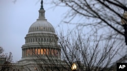 FILE - The Capitol is seen in Washington, Dec. 5, 2017, days before President Trump signed a stopgap measure gives lawmakers and the White House until Dec. 22 to work out a final spending bill that will keep the lights on.