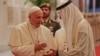 Pope Francis is welcomed by Abu Dhabi's Crown Prince Sheikh Mohammed bin Zayed Al Nahyan, upon his arrival at the Abu Dhabi airport, United Arab Emirates, Feb. 3, 2019.