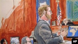 Assistant US Attorney Nicholas Lewin, foreground, gives his opening statement to the jury in the trial of Ahmed Khalfan Ghailani, left, in Manhattan Federal Court 12 October 2010 (file photo)