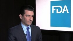 FILE - Then-Food and Drug Administration Commissioner Scott Gottlieb listens during an interview with The Associated Press in New York, March 5, 2018.