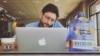 FILE - This undated file photo released June 4, 2021, courtesy of the Fenster family, shows US journalist Danny Fenster working in New Iberia, Louisiana.