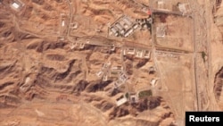 這張衛星圖顯示了一名美國研究人員所說的以色列空襲德黑蘭附近的帕爾欽軍事基地後的現場。 (2024年10月26日)