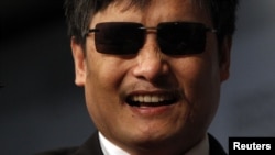 Activist and advocate Chen Guangcheng smiles at the Council on Foreign Relations in New York, May 31, 2012.