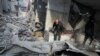 Consequências de um ataque israelita a uma casa na cidade de Gaza