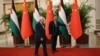 FILE - Chinese Premier Li Qiang, right, receives Palestinian President Mahmud Abbas at the Great Hall of the People in Beijing on June 15, 2023. 