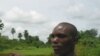 Villager shows effects of an oil spill right behind his home in Nigeria's Niger Delta region. (file photo)