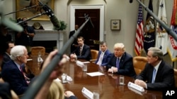 President Donald Trump speaks during a roundtable on the "Foreign Investment Risk Review Modernization Act" in the Roosevelt Room of the White House, Aug. 23, 2018, in Washington. 