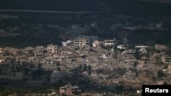 Destroyed buildings lie in ruin on Lebanon’s side of the border with Israel, amid ongoing hostilities between Hezbollah and Israeli forces, as seen from Mount Addir, northern Israel, Nov. 4, 2024.