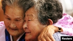 FILE - North and South Korean separated family members meet during a reunion at Mount Kumgang resort, North Korea, August 24, 2018. (Yonhap via REUTERS)