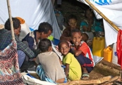 Ethiopian refugees who fled fighting in Tigray province are pictured at the Um Rakuba camp in Sudan's eastern Gedaref province, Nov. 19, 2020.