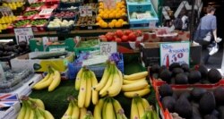 FILE - A fruit stall displays fruit at a market in London, Aug. 7, 2019. Among Kenya's exports to Britain are fruits and vegetables.