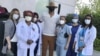 In Virus Crisis, People Find Purpose in Helping Others