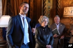 From left, U.S. President-elect Donald Trump's son Eric Trump, his chief of staff Susie Wiles and his Middle East envoy Steve Witkoff listen during a news conference at Mar-a-Lago in Palm Beach, Florida, Jan. 7, 2025.