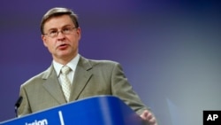 Executive Vice President of the European Commission Valdis Dombrovskis speaks during a media conference on the European Semester Spring Package at EU headquarters in Brussels, June 2, 2021. 