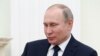 Le président russe Vladimir Poutine s'exprime lors d'une réunion au Kremlin à Moscou, le 15 février 2018.