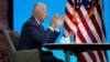 FILE - President-elect Joe Biden participates in a virtual meeting at The Queen theater, December 4, 2020, in Wilmington, Del.