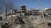 Mass Grave Found Near Mosul After Islamic State Retreat 