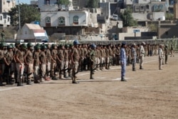 Newly recruited soldiers are pictured before a blast struck their parade in the town of al-Dhalea, Yemen, Dec. 29, 2019.