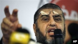 Egypt's Muslim Brotherhood presidential candidate Khairat el-Shater talks to reporters during a press conference in Cairo, Egypt Monday, April 9, 2012.