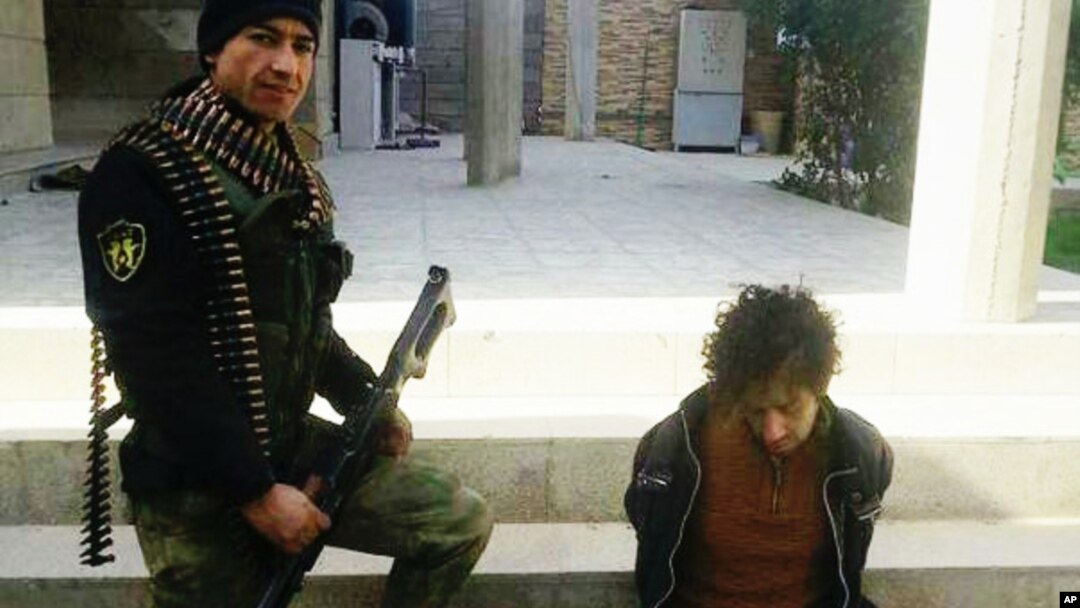 A suspected fighter with the Islamic State group in police custody in Ramadi, 70 miles (115 kilometers) west of Baghdad, Iraq, Jan. 18, 2016.