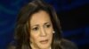 US Vice President and Democratic presidential candidate Kamala Harris listens to former US President and Republican presidential candidate Donald Trump speak during a presidential debate at the National Constitution Center in Philadelphia, Pennsylvania, o