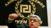 Leader of extreme-right Golden Dawn party Nikolaos Mihaloliakos talks to reporters, Athens, May 6, 2012.