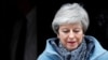 Britain's Prime Minister Theresa May leaves 10 Downing Street as she faces votes on Brexit options, in London, March 27, 2019.