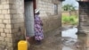 Edeline Gweshe is one of the citizens affected by floods after building on waterlands in Chitungwiza, Zimbabwe. (Columbus Mavhunga/VOA)