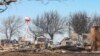 Las llamas amenazan poblaciones en Texas, que registra uno de los mayores incendios de su historia