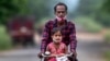 India PM Vows Larger Federal Role in Vaccine Procurement 