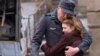 This image released by 20th Century Fox, April 9, 2013, shows Geoffrey Rush, left, and Sophie N&#233;lisse in a scene from &quot;The Book Thief,&quot; about a girl who loves books.