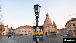 General view of the empty Neumarkt square during the local coronavirus disease (COVID-19) lockdown in Dresden, Germany, Dec. 14, 2020.