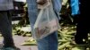 Ham for a Watch: Venezuelans Struggle With Cash Shortages