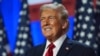 ARCHIVO - El entonces candidato presidencial republicano, el expresidente Donald Trump, sonríe en una fiesta para ver la noche de las elecciones en el Centro de Convenciones de Palm Beach, el 6 de noviembre de 2024, en West Palm Beach, Florida.