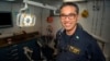 FILE - Vietnamese American Hien Trinh on the USS Carl Vinson.