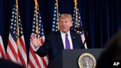 President Donald Trump speaks during a news conference at his Trump National Golf Club in Bedminster, New Jersey, Aug. 15, 2020.