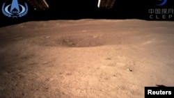 The far side of the moon, photographed by the Chang'e-4 lunar probe, is seen in this image provided by China National Space Administration, Jan. 3, 2019.