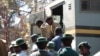 Suspected demonstrators make a court appearance in Harare, Zimbabwe, Aug. 29, 2016.