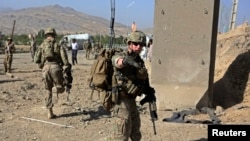 AS dan Afghanistan berusaha merampungkan perjanjian yang akan mengjijinkan pasukan koalisi tetap berada di Afghanistan setelah 2014 (foto: dok). 